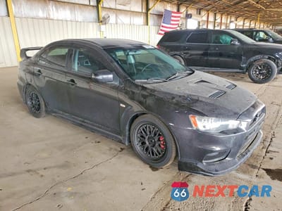 Czwarte zdjęcie samochodu z boku: 2015 MITSUBISHI LANCER EVOLUTION GSR VIN:JA32W8FV1FU007788 - miniatura