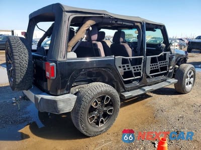 Trzecie zdjęcie samochodu z tyłu: 2014 JEEP WRANGLER UNLIMITED SAHARA VIN:1C4BJWEG1EL210563 - miniatura