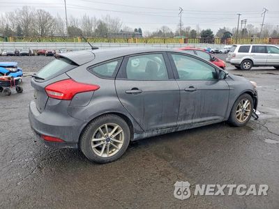 Trzecie zdjęcie samochodu z tyłu: 2017 FORD FOCUS SE VIN:1FADP3K20HL206884 - miniatura
