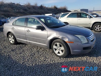 Czwarte zdjęcie samochodu z boku: 2006 FORD FUSION SE VIN:3FAFP07196R125727 - miniatura
