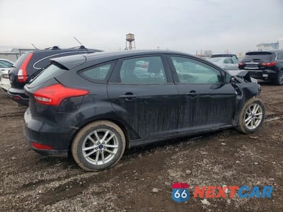 Trzecie zdjęcie samochodu z tyłu: 2015 FORD FOCUS SE VIN:1FADP3K24FL282217 - miniatura