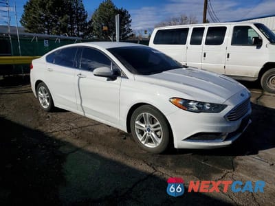 Czwarte zdjęcie samochodu z boku: 2018 FORD FUSION SE VIN:3FA6P0HDXJR218306 - miniatura