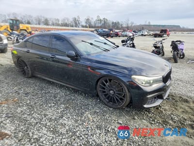 Czwarte zdjęcie samochodu z boku: 2017 BMW 740 I VIN:WBA7E2C33HG741003 - miniatura