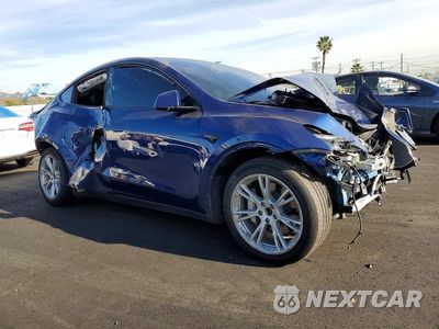 Czwarte zdjęcie samochodu z boku: 2022 TESLA MODEL Y VIN:7SAYGDEE2NF340532 - miniatura