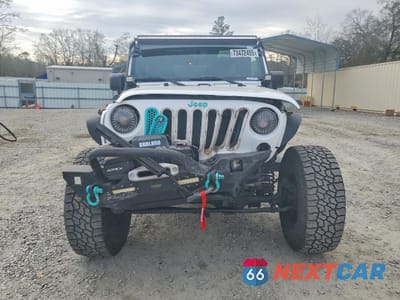 Piąte zdjęcie samochodu w środku: 2014 JEEP WRANGLER UNLIMITED SPORT VIN:1C4BJWDG7EL208463 - miniatura