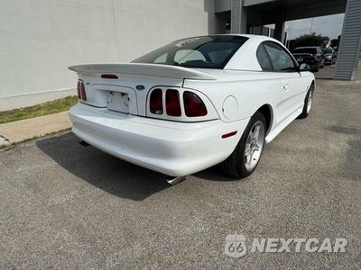 Czwarte zdjęcie samochodu z boku: 1997 FORD MUSTANG COBRA VIN:1FALP47V5VF111087 - miniatura