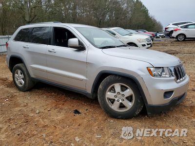 Czwarte zdjęcie samochodu z boku: 2012 JEEP GRAND CHEROKEE LAREDO VIN:1C4RJEAGXCC360313 - miniatura