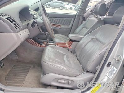 Zdjęcie 7 z 12 samochodu: 2003 TOYOTA CAMRY LE VIN:4T1BF30K63U037976 - miniatura