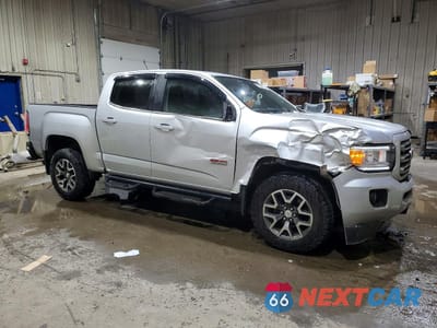 Czwarte zdjęcie samochodu z boku: 2016 GMC CANYON SLE VIN:1GTG6CE39G1108686 - miniatura