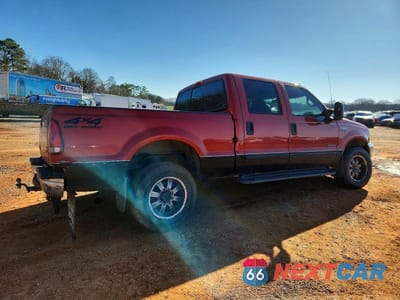 Trzecie zdjęcie samochodu z tyłu: 2001 FORD F250 SUPER DUTY VIN:1FTNW21F21EB20759 - miniatura