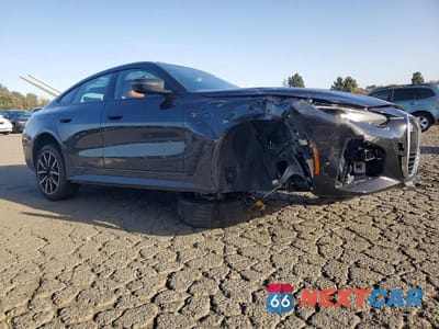 Czwarte zdjęcie samochodu z boku: 2022 BMW I4 EDRIVE 40 VIN:WBY73AW0XNFN08014 - miniatura