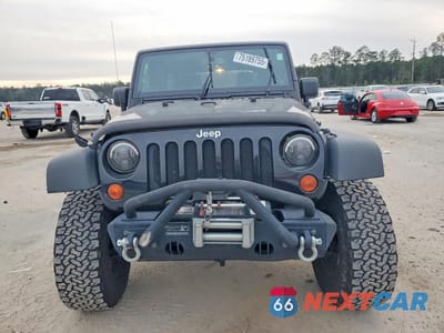 Piąte zdjęcie samochodu w środku: 2013 JEEP WRANGLER UNLIMITED SPORT VIN:1C4BJWDGXDL590602 - miniatura