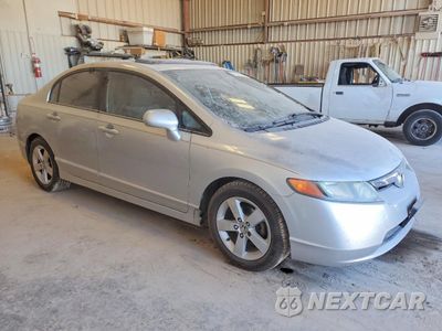 Czwarte zdjęcie samochodu z boku: 2006 HONDA CIVIC EX VIN:1HGFA16856L025334 - miniatura