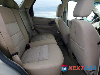 Zdjęcie 11 z 13 samochodu: 2006 FORD ESCAPE XLT VIN:1FMYU93136KA60699 - miniatura