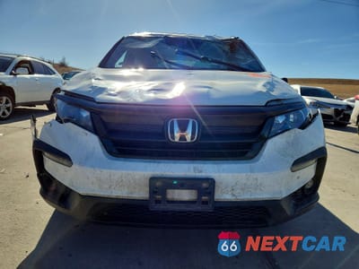 Piąte zdjęcie samochodu w środku: 2022 HONDA PILOT TRAILSPORT VIN:5FNYF6H85NB044728 - miniatura