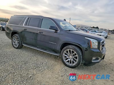 Czwarte zdjęcie samochodu z boku: 2016 GMC YUKON XL C1500 SLE VIN:1GKS1FKC8GR265548 - miniatura