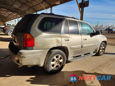 Trzecie zdjęcie samochodu z tyłu: 2002 GMC ENVOY VIN:1GKDT13S022445118 - miniatura