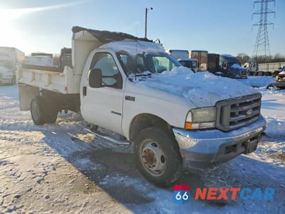 Czwarte zdjęcie samochodu z boku: 2002 FORD F450 SUPER DUTY DUMP TRUCK VIN:1FDXF46F22EA18341 - miniatura