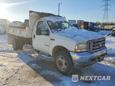 Czwarte zdjęcie samochodu z boku: 2002 FORD F450 SUPER DUTY DUMP TRUCK VIN:1FDXF46F22EA18341 - miniatura