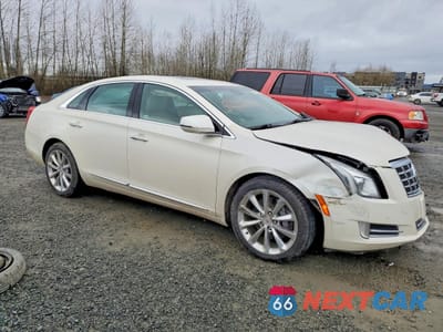 Czwarte zdjęcie samochodu z boku: 2013 CADILLAC XTS PREMIUM COLLECTION VIN:2G61T5S3XD9112948 - miniatura