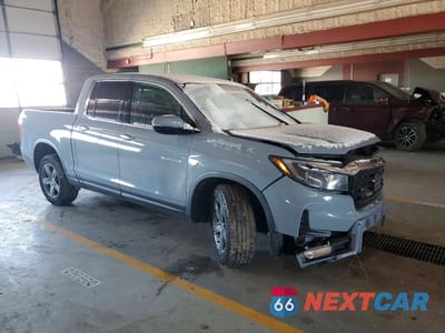 Czwarte zdjęcie samochodu z boku: 2023 HONDA RIDGELINE RTL-E VIN:5FPYK3F72PB004184 - miniatura