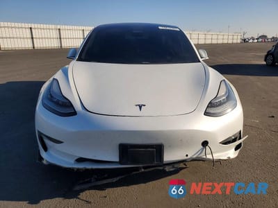 Piąte zdjęcie samochodu w środku: 2019 TESLA MODEL 3 VIN:5YJ3E1EB4KF511407 - miniatura