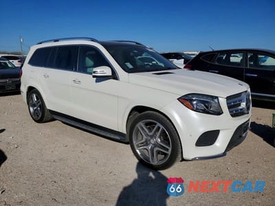 Czwarte zdjęcie samochodu z boku: 2017 MERCEDES-BENZ GLS 550 4MATIC VIN:4JGDF7DE6HA879634 - miniatura