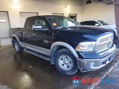 Czwarte zdjęcie samochodu z boku: 2015 RAM 1500 LARAMIE VIN:1C6RR7JM7FS573103 - miniatura