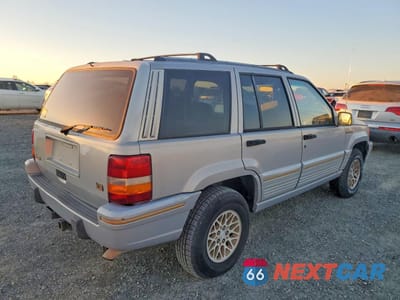 Trzecie zdjęcie samochodu z tyłu: 1995 JEEP GRAND CHEROKEE LIMITED VIN:1J4GZ78Y8SC516397 - miniatura