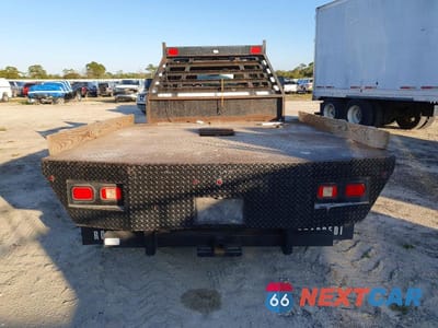 Zdjęcie 6 z 12 samochodu: 2017 GMC SIERRA FLATBED TRUCK VIN:1GD41VCG1HF219414 - miniatura