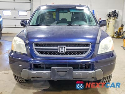 Piąte zdjęcie samochodu w środku: 2004 HONDA PILOT LX VIN:2HKYF18494H537151 - miniatura