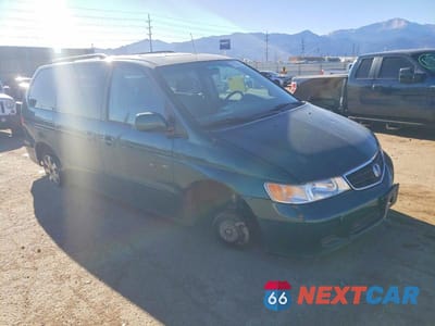 Czwarte zdjęcie samochodu z boku: 2002 HONDA ODYSSEY EXL VIN:5FNRL18982B009248 - miniatura