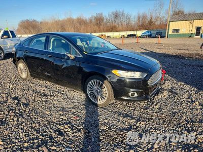 Czwarte zdjęcie samochodu z boku: 2016 FORD FUSION TITANIUM VIN:3FA6P0K98GR361171 - miniatura