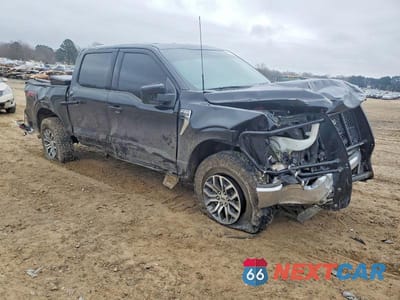 Czwarte zdjęcie samochodu z boku: 2022 FORD F150 SUPERCREW VIN:1FTFW1E88NFB99171 - miniatura