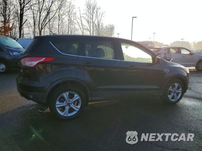 Trzecie zdjęcie samochodu z tyłu: 2014 FORD ESCAPE SE VIN:1FMCU0GX1EUD35493 - miniatura