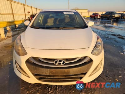 Piąte zdjęcie samochodu w środku: 2013 HYUNDAI ELANTRA GT BASE VIN:KMHD35LE5DU073968 - miniatura