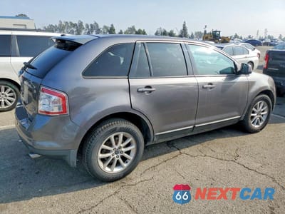 Trzecie zdjęcie samochodu z tyłu: 2010 FORD EDGE SEL VIN:2FMDK4JC0ABB59852 - miniatura