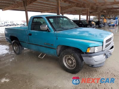 Czwarte zdjęcie samochodu z boku: 1997 DODGE RAM 1500 VIN:1B7HC16X6VS109871 - miniatura