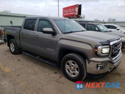 Czwarte zdjęcie samochodu z boku: 2017 GMC SIERRA K1500 SLE VIN:3GTU2MEC2HG304217 - miniatura
