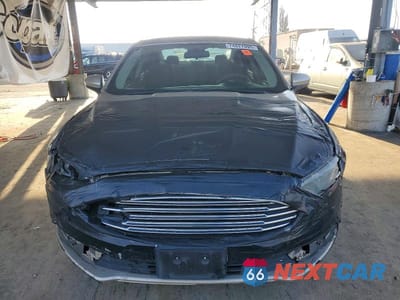 Piąte zdjęcie samochodu w środku: 2017 FORD FUSION SE HYBRID VIN:3FA6P0LU8HR343984 - miniatura