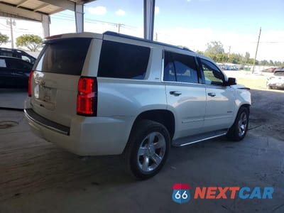 Trzecie zdjęcie samochodu z tyłu: 2015 CHEVROLET TAHOE K1500 LTZ VIN:1GNSKCKC5FR179207 - miniatura