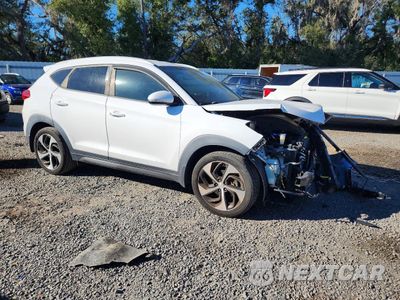 Czwarte zdjęcie samochodu z boku: 2016 HYUNDAI TUCSON LIMITED VIN:KM8J33A2XGU161676 - miniatura