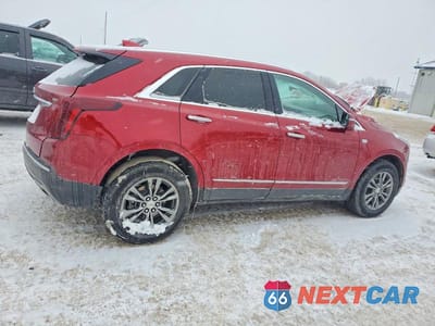 Trzecie zdjęcie samochodu z tyłu: 2021 CADILLAC XT5 PREMIUM LUXURY VIN:1GYKNCRSXMZ160110 - miniatura