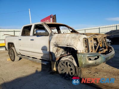 Czwarte zdjęcie samochodu z boku: 2018 GMC SIERRA K1500 SLT VIN:3GTU2NEJ6JG540718 - miniatura