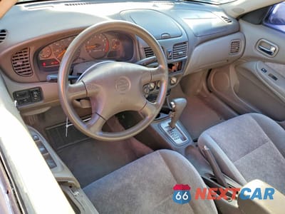 Zdjęcie 8 z 12 samochodu: 2000 NISSAN SENTRA BASE VIN:3N1CB51A0YL385671 - miniatura
