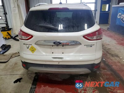 Zdjęcie 6 z 12 samochodu: 2016 FORD ESCAPE TITANIUM VIN:1FMCU9JX8GUA58471 - miniatura