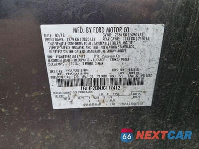 Zdjęcie 12 z 12 samochodu: 2018 FORD TAURUS SEL VIN:1FAHP2E84JG117412 - miniatura