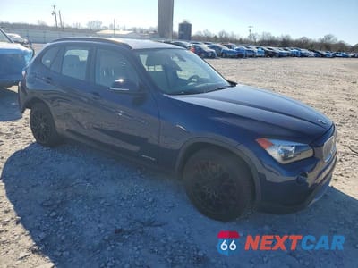 Czwarte zdjęcie samochodu z boku: 2014 BMW X1 SDRIVE28I VIN:WBAVM1C53EVW54795 - miniatura