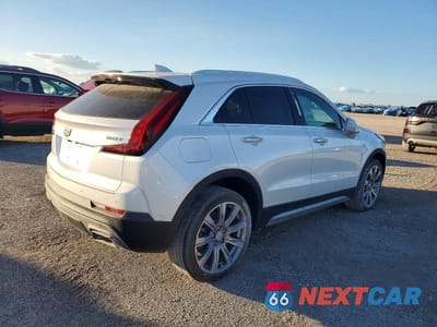Trzecie zdjęcie samochodu z tyłu: 2019 CADILLAC XT4 PREMIUM LUXURY VIN:1GYFZCR48KF206877 - miniatura