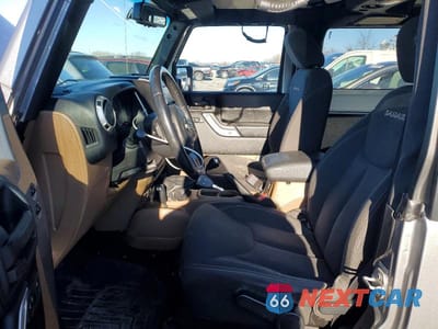 Zdjęcie 7 z 14 samochodu: 2016 JEEP WRANGLER SAHARA VIN:1C4AJWBG0GL307823 - miniatura